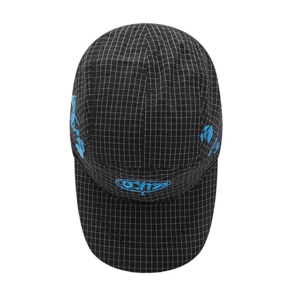 Black and white hat with blue patches 